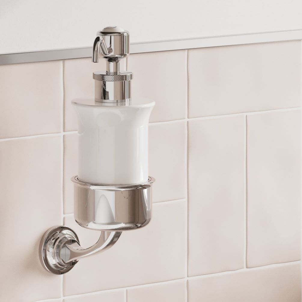 Close up lifestyle image of Burlington Guild Chrome Wall Mounted Soap Dispenser